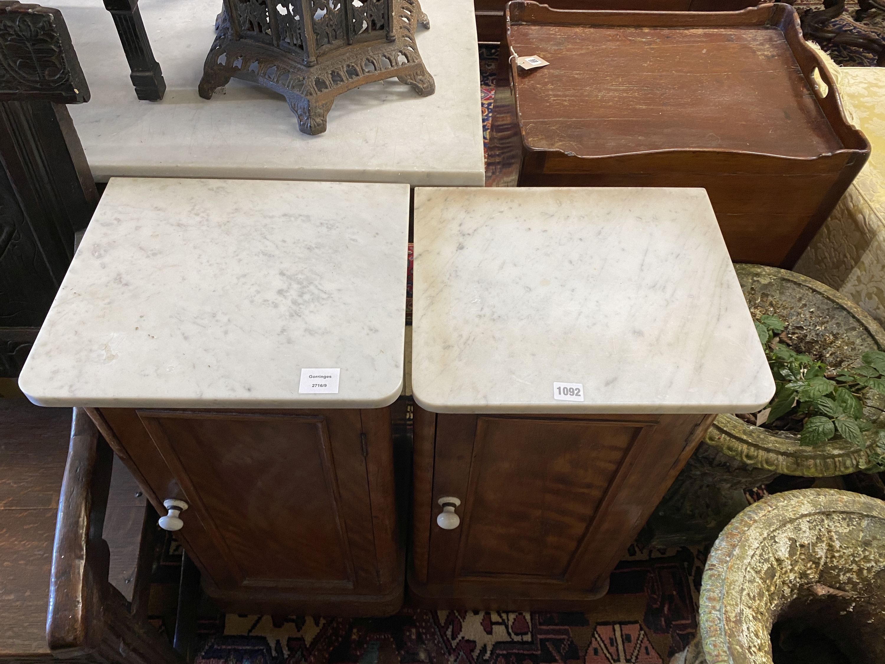 A pair of Victorian satin walnut bedside cupboards with white marble tops, width 39cm, depth 34cm, height 78cm